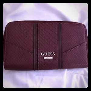 Guess wallet. Zippered, multi compartment. Oxblood